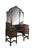 An antique Depression-era makeup vanity crafted in the Jacobean Gothic Revival style, circa 1920s to 1930s. The exterior...