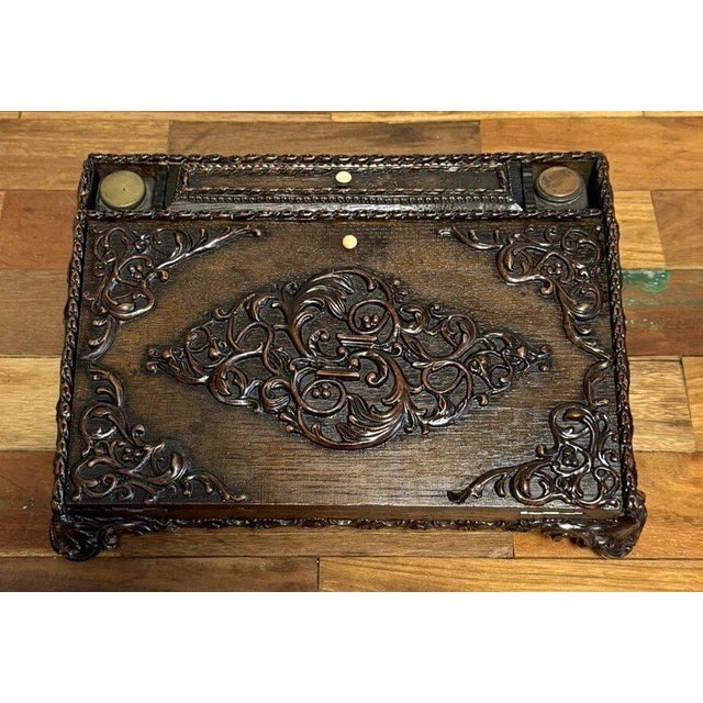 Carved wooden writing desk/travel secretary, napoleon iii period, circa 1850 completely complete with its two reservoirs...