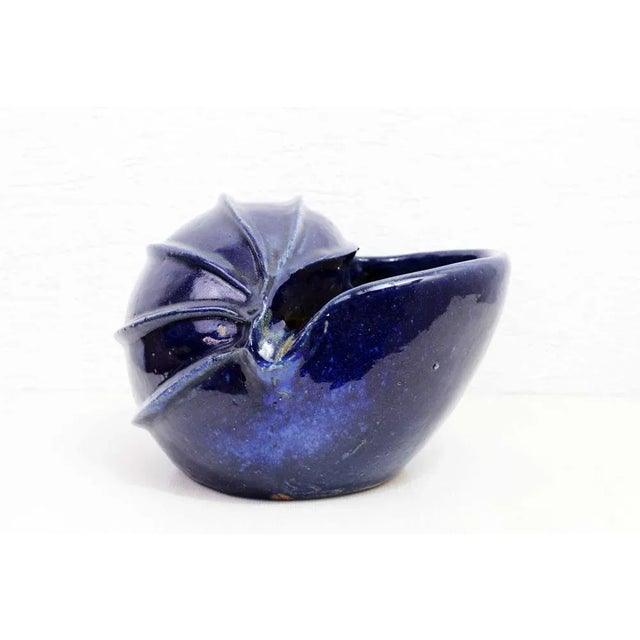 Nice "shell" flower pot enameled terracotta Vintage made in France with a really original space space. This flowerpot is...