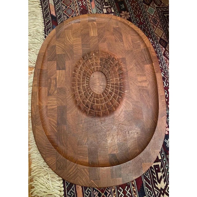 Beautiful and rare vintage 1960's Danish modern teak cutting board. Made by Digsmed, Denmark. Marked: 'Digsmed Denmark...