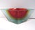 Mid-century Mandruzzato Murano sommerso angled blown glass bowl in ruby red, amber and pale blue. There is a small...