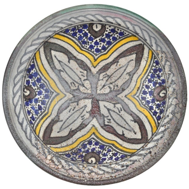 One-of-a-kind antique handcrafted and glazed Moroccan ceramic bowl featuring an elaborate hand-painted colorful Afro-...