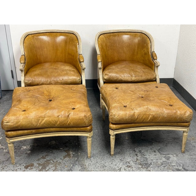 Design Plus Gallery presents a Pair of Custom Hendrix Allardyce Louis XVI Style Bergere Armchairs + Ottomans by Belmar...