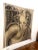 Hand woven 100% wool tapestry fragment featuring a cherub in charcoal colors. Left facing. Tapestry fragments are great...
