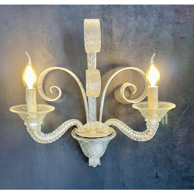 Discover this magnificent pair of Murano glass wall sconces, dating from the 1940s. Each wall light, of remarkable...