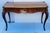 Antique French Louis XVI style writing desk in fruitwood marquetary, with ormolu border and brass carriatides on the...