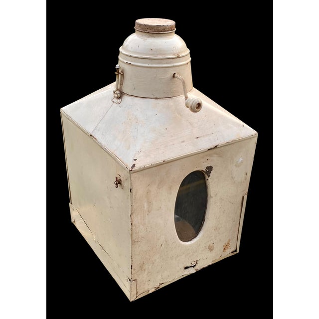 This is an antique metal flour sifter bin, commonly known as a Hoosier cabinet flour bin, used for storing and dispensing...