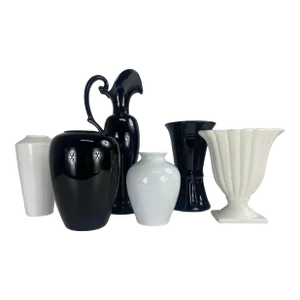 Mid Century Complementary Grouping of Black and White Pottery Vases.