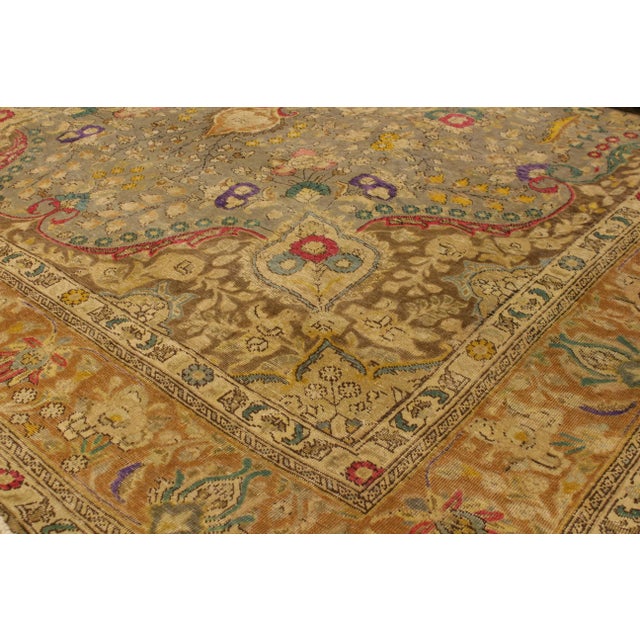 A mesmerizing addition to any décor, this brand-new hand knotted vintage distressed wool rug featuring vibrant colors and...