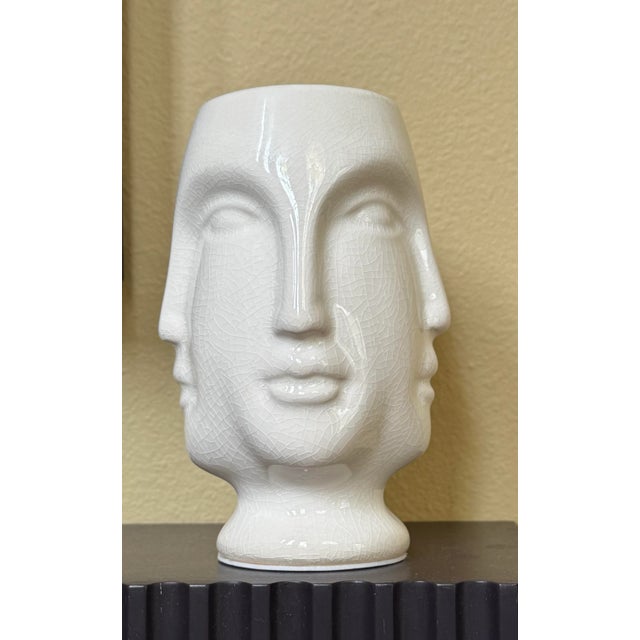 In the style of John Adler’s “Dora Maar” this vintage vase replicates faces on all four sides. "Dora Maar" was known as...