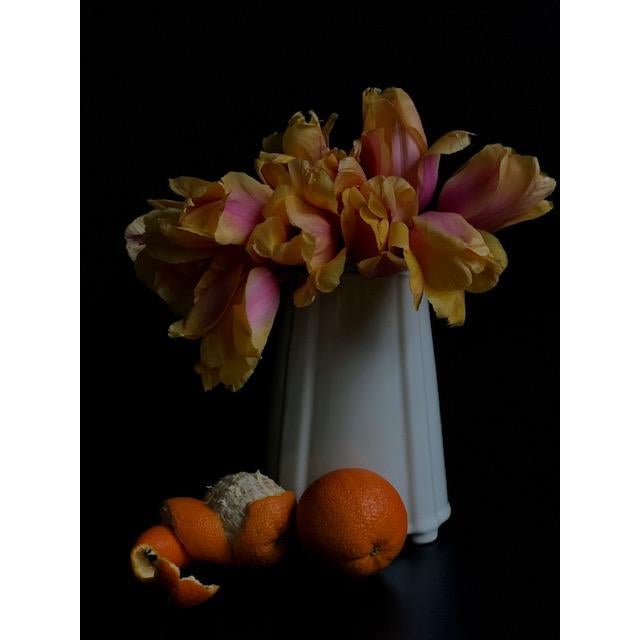 Lidded ceramic white tea jar perfect for floral arrangements or decor on its own.
