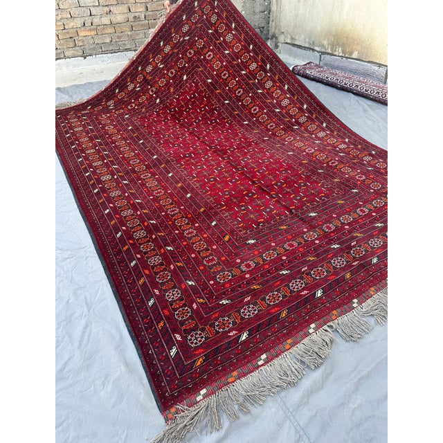 Textile High Quality Red Afghan Mauri Hand-Knotted Wool Rug - 6' X 9'8" For Sale - Image 7 of 10
