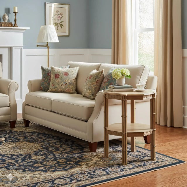 Handcrafted from solid mahogany and finished in a warm fruitwood tone, it features a faux bamboo frame accented by...