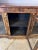 Stunning antique Victorian quality burr walnut breakfront bookcase, having a quality burr walnut breakfront shaped top...