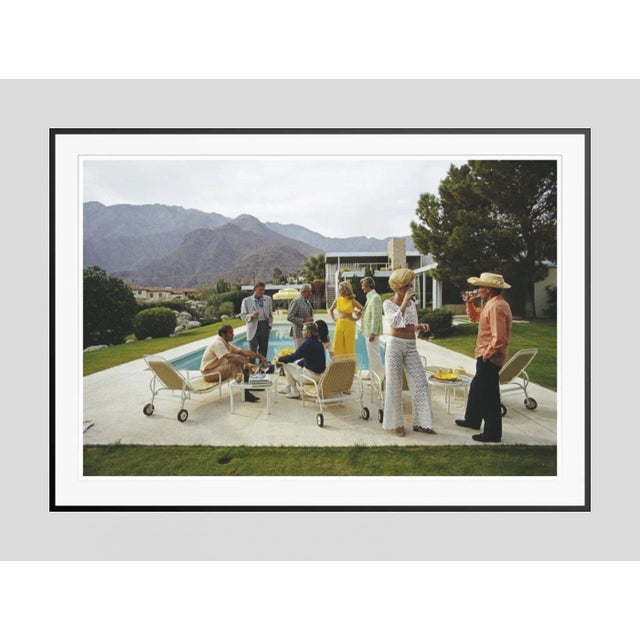 Desert house party' by slim aarons open edition a poolside party at a desert house, designed by richard neutra for edgar...
