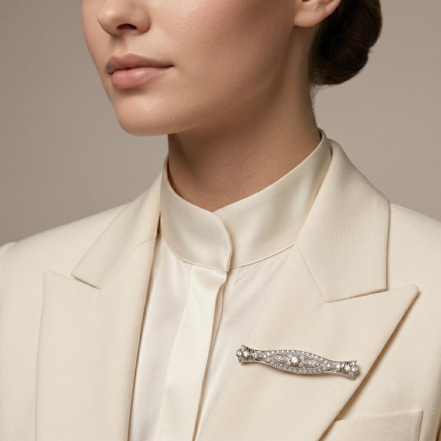 This exquisite Antique Milgrain Filigree Bar Brooch showcases the timeless elegance of fine jewelry craftsmanship. Crafted...