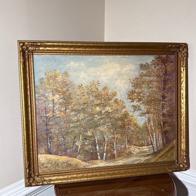 Bring classic charm to your home with this beautiful vintage oil painting on canvas, featuring a peaceful river landscape...