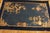 This early 20th-century calming antique Chinese rug is a jewel-like example of the "East-meets-West" aesthetic that...