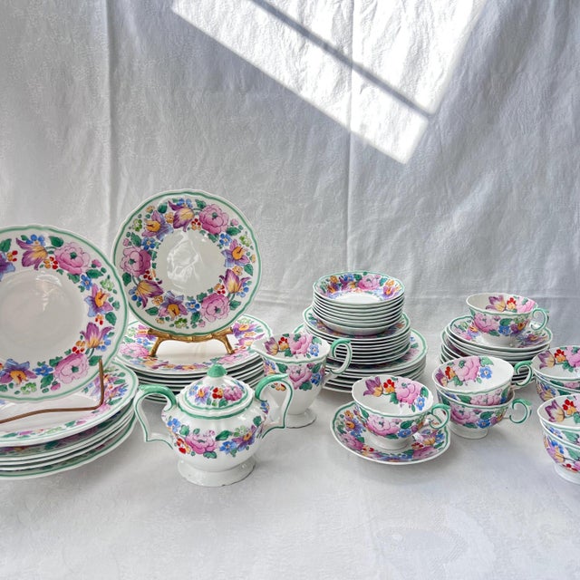 This is a darling set of Crown Staffordshire fine bone china in a darling, springy design - the perfect little set for a...
