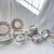 This is a darling set of Crown Staffordshire fine bone china in a darling, springy design - the perfect little set for a...