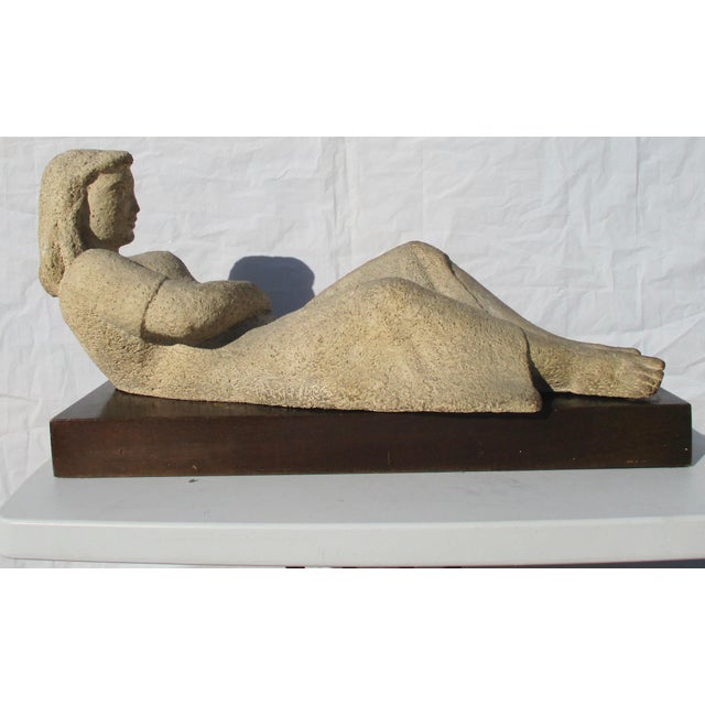 Sculpture of a reclining woman by Berta Margoulies (1907-1996). High style from mid-century modernism. Cast in concrete,...