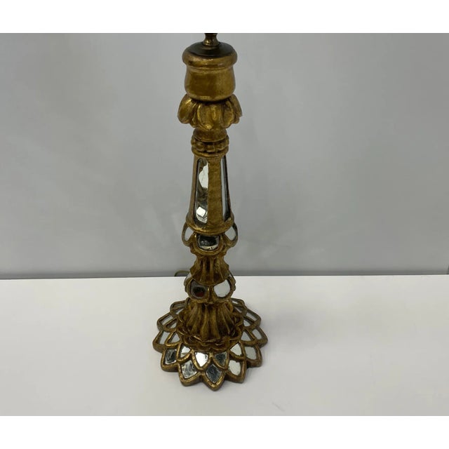 Glistening pair of lovely Italian giltwood table lamps having inset pieces of mirror that add glamour and shine. Shades...