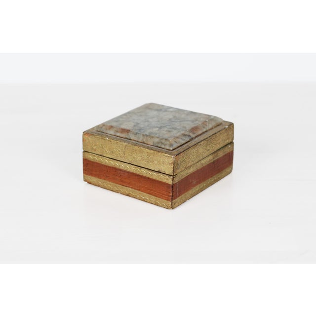 1960's small square Florentine trinket box featuring gilded wood with hand-tooled scalloped and foliate borders, and a...