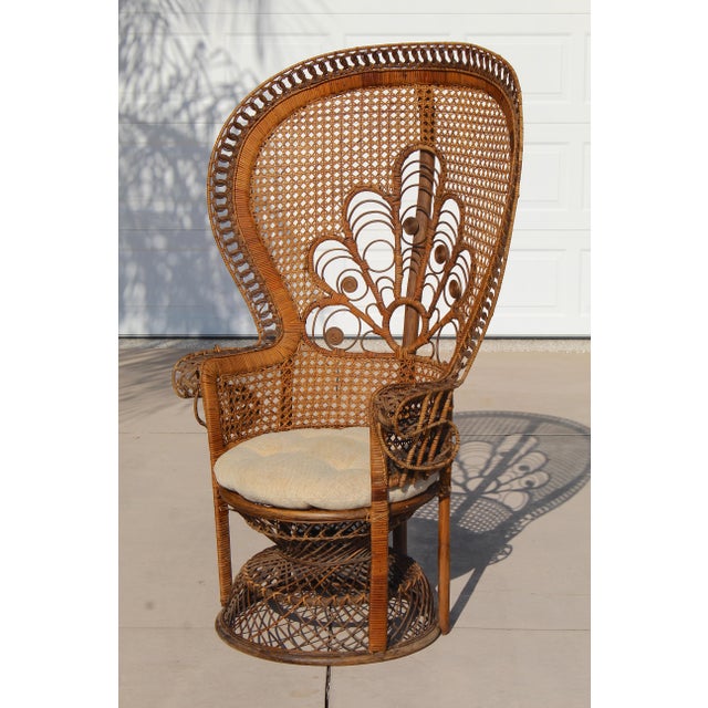 Make a bold statement with this iconic vintage Peacock chair, handcrafted in Thailand during the height of the bohemian...