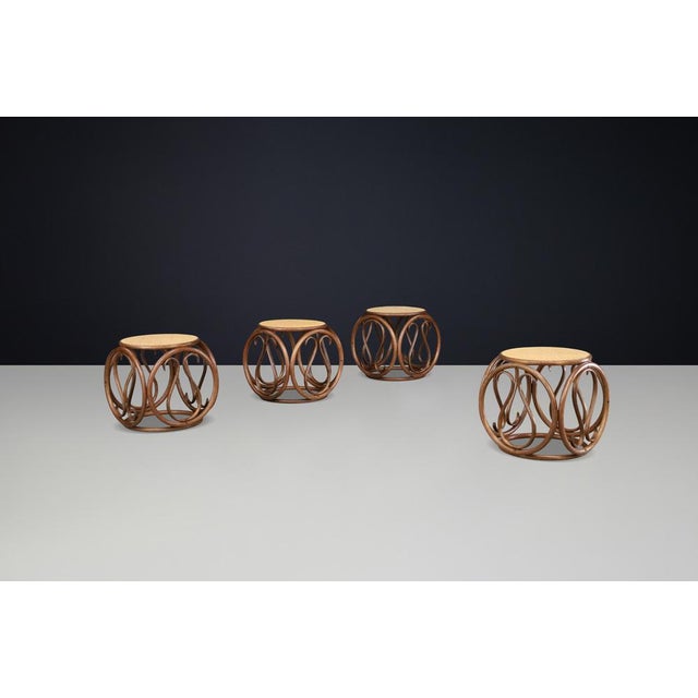 Set of Four 1960s Austrian Bentwood and Cane Stools / Side Tables Attributed to Michael Thonet This elegant set of four...