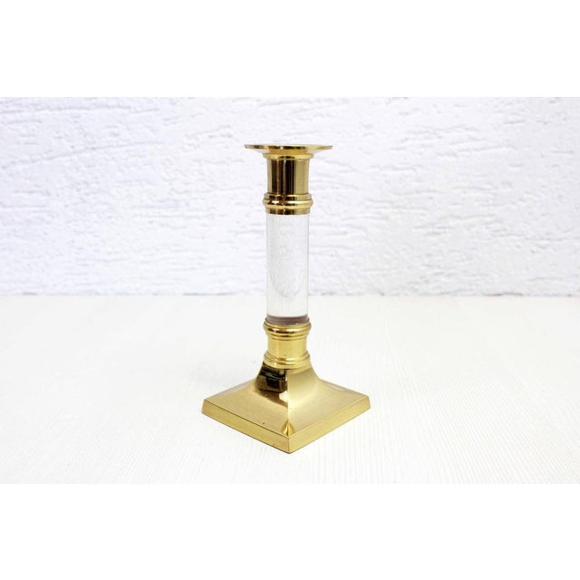 Pretty vintage candleholder in acrylic glass and brass. with a timeless design, this 70s candle holder will quickly find...