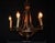 An impressive french five-light chandelier dating to the 1920s, beautifully constructed in bronze and gilt bronze with...