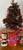 Vintage Holiday set arrangement with bottle brush tree , porcelain Santa and mini teddy bear.
