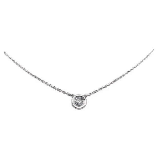 This is part of Chairish’s Fine Jewelry assortment. This contemporary necklace features a solitaire diamond set in a round...