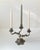 A stylish naturalistically perceived 3-arm candelabra fashioned from Brass. The style is Baroque revival and this piece...