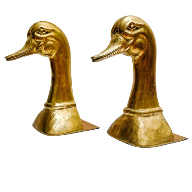 A pair of large scale mid-century solid brass Mallard duck head bookends by Sarreid Spain. These are significant pieces,...