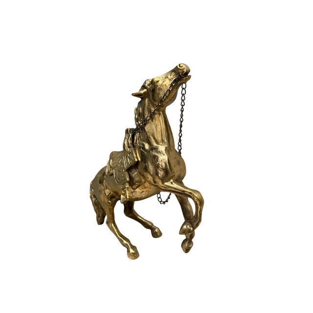 This extra large brass horse statue captures the pure energy of motion; a stallion rearing proudly, full of life and...