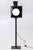 steel, painted black. White glass H. ca. 142 cm. European Plug (up to 250V).The wiring of this item may be original and...