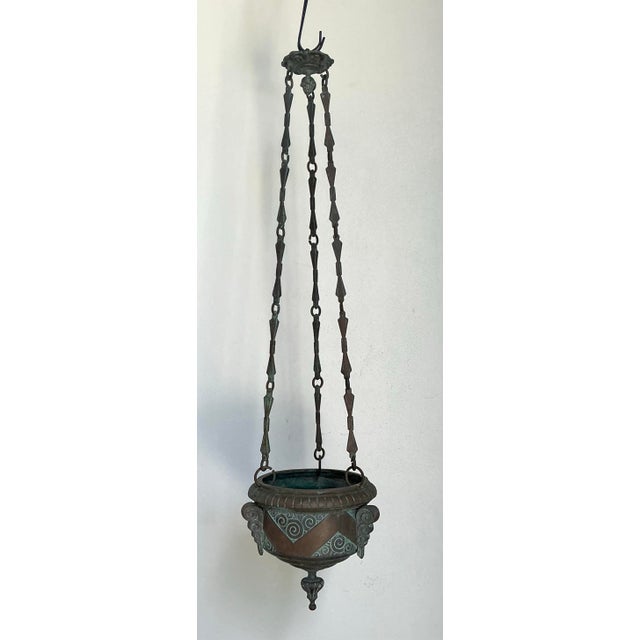 This striking vintage hanging censer exudes an old-world charm, drawing influence from Neoclassical and Grand Tour...