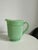 1930s Vintage Art Deco Jadeite Glass Pitcher This vintage pitcher is crafted from green glass, adding a touch of nostalgia...