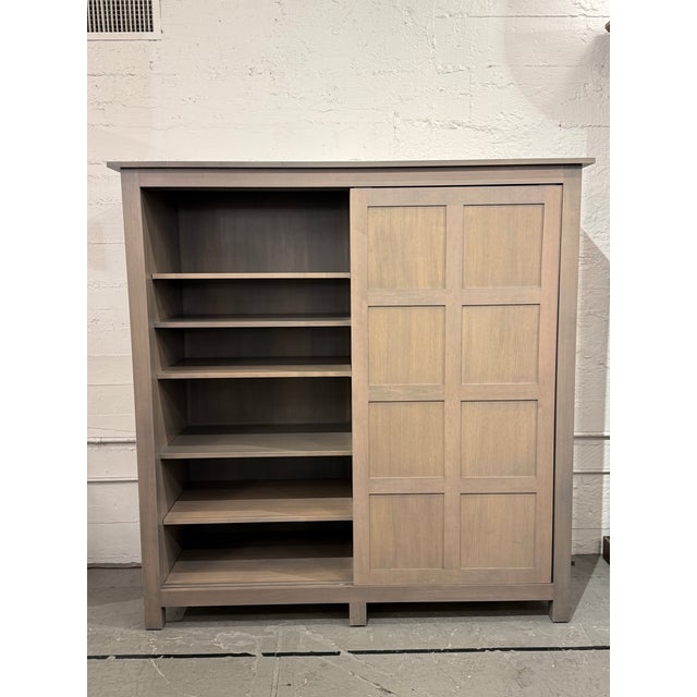 Design Plus Gallery presents a Bennett Armoire from Room & Board. Crafted of oak with a soft gray-wash finish, this...