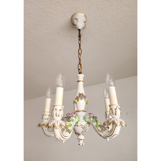 Exceptionally luxurious 5-light baroque capodimonte chandelier made of porcelain, hand-molded, hand-painted, and gilded...
