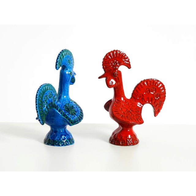 Pair of very beautiful decorative ceramic roosters from the 1960s. The design is by the renowned Italian artist and...