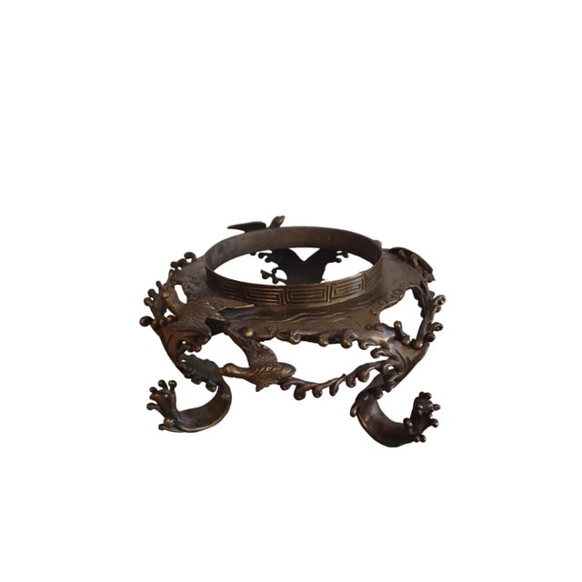 Vintage bronze Japanese vase on stand. Vase depicts flying Cranes and ducks in 3D detail. Base sits on separate tripod...