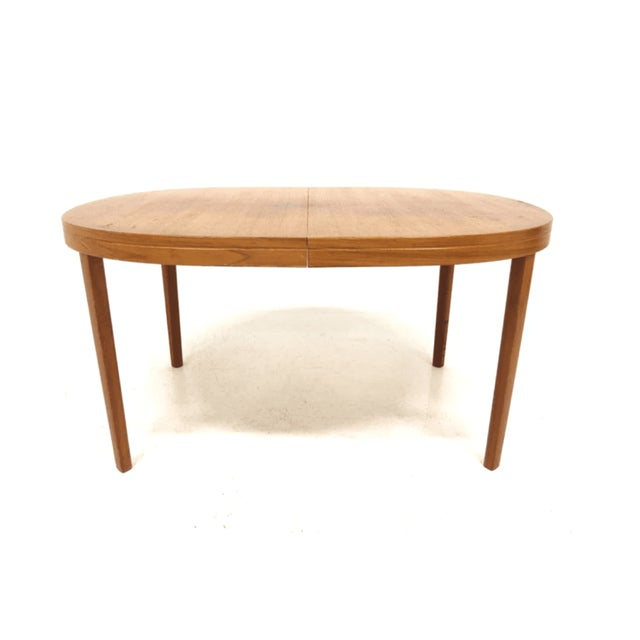 Tibro oval table, vintage Swedish teak from the 1950s, with a central extension, an elegant design perfect for mid-century...