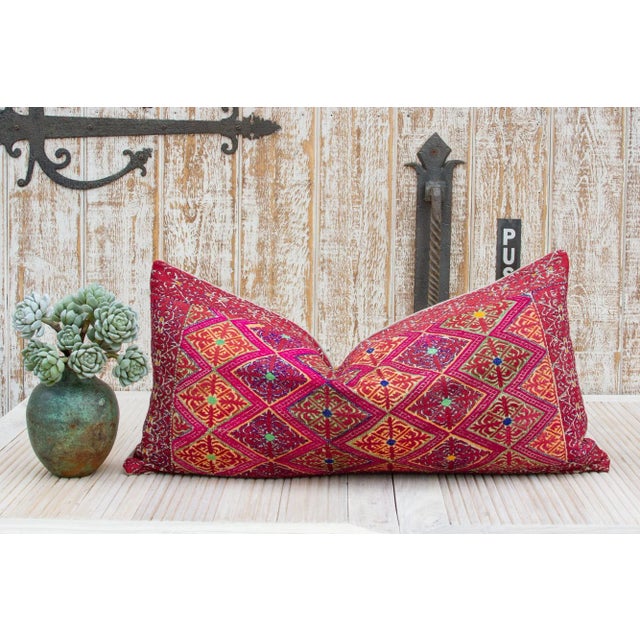 Beautiful hand-embroidered Indian throw pillow from the rich agricultural states of Punjab where artisans are famous for...