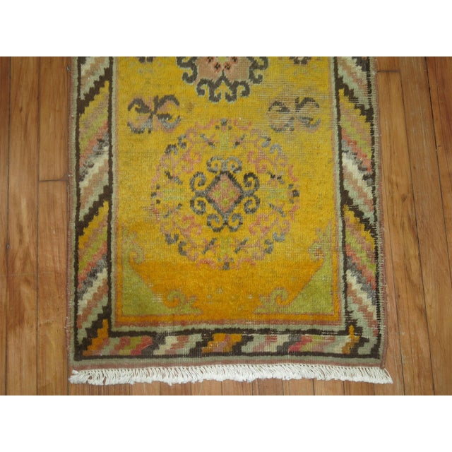 a Whimsical antique Khotan small rug 2'1'' x 4'