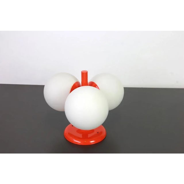 Midcentury vintage flush mount fixture in orange color made by Kaiser Leuchten, Germany. Original from 1960s It needs 3 x...