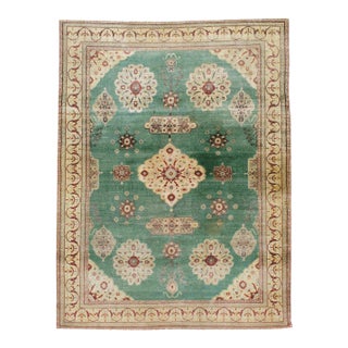 Galerie Shabab Collection Early 20th Century Green, Red, and Beige Distressed Rug For Sale