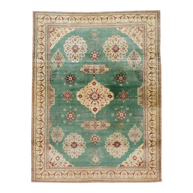 Galerie Shabab Collection Early 20th Century Green, Red, and Beige Distressed Rug For Sale