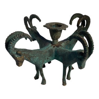 1950s Green Patina Solid Brass Candle Holder With Four Ram Figures For Sale